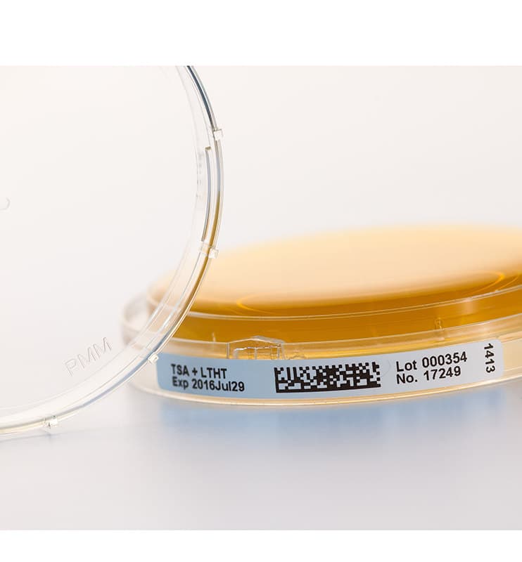 A labelled agar contact plate with lot number.