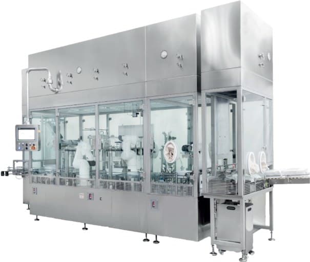 A vial filling and closing machine with enclosed stations.